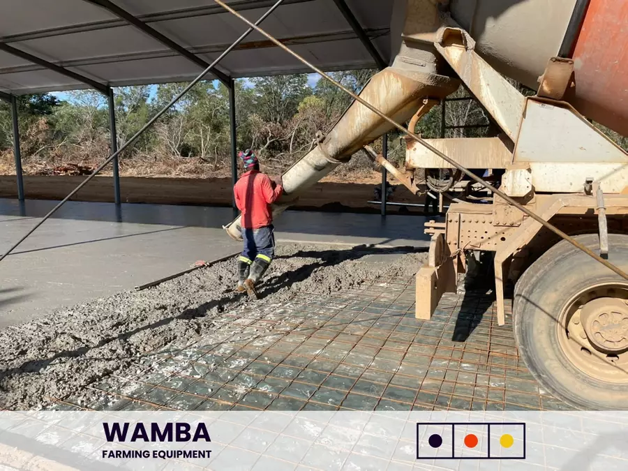 Truck pouring concrete.