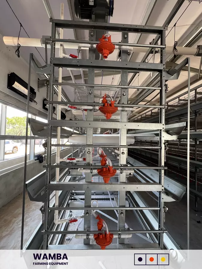 Cage section with partiall assembled watering system.